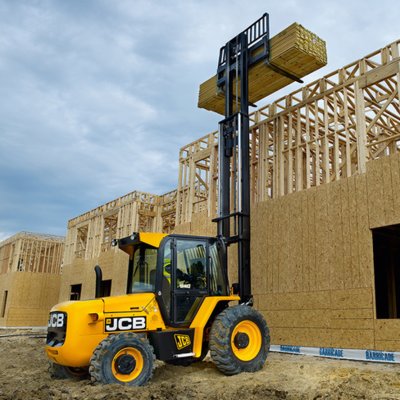 Forklift unloading machinery and industrial equipment in Finchley